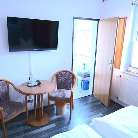 Hotel & Restaurant Am Bodden พุทบัส ภายนอก รูปภาพ