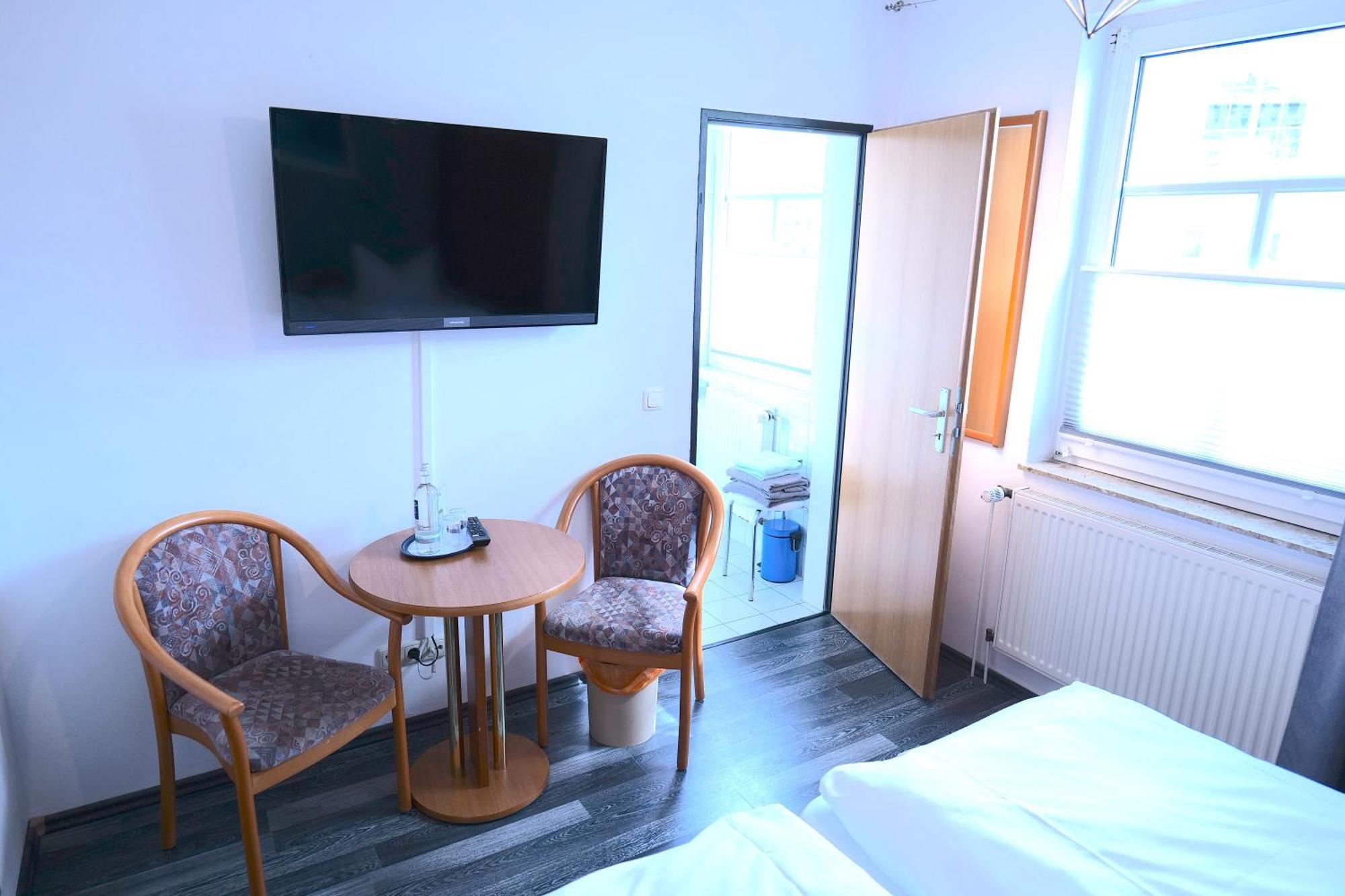 Hotel & Restaurant Am Bodden พุทบัส ภายนอก รูปภาพ