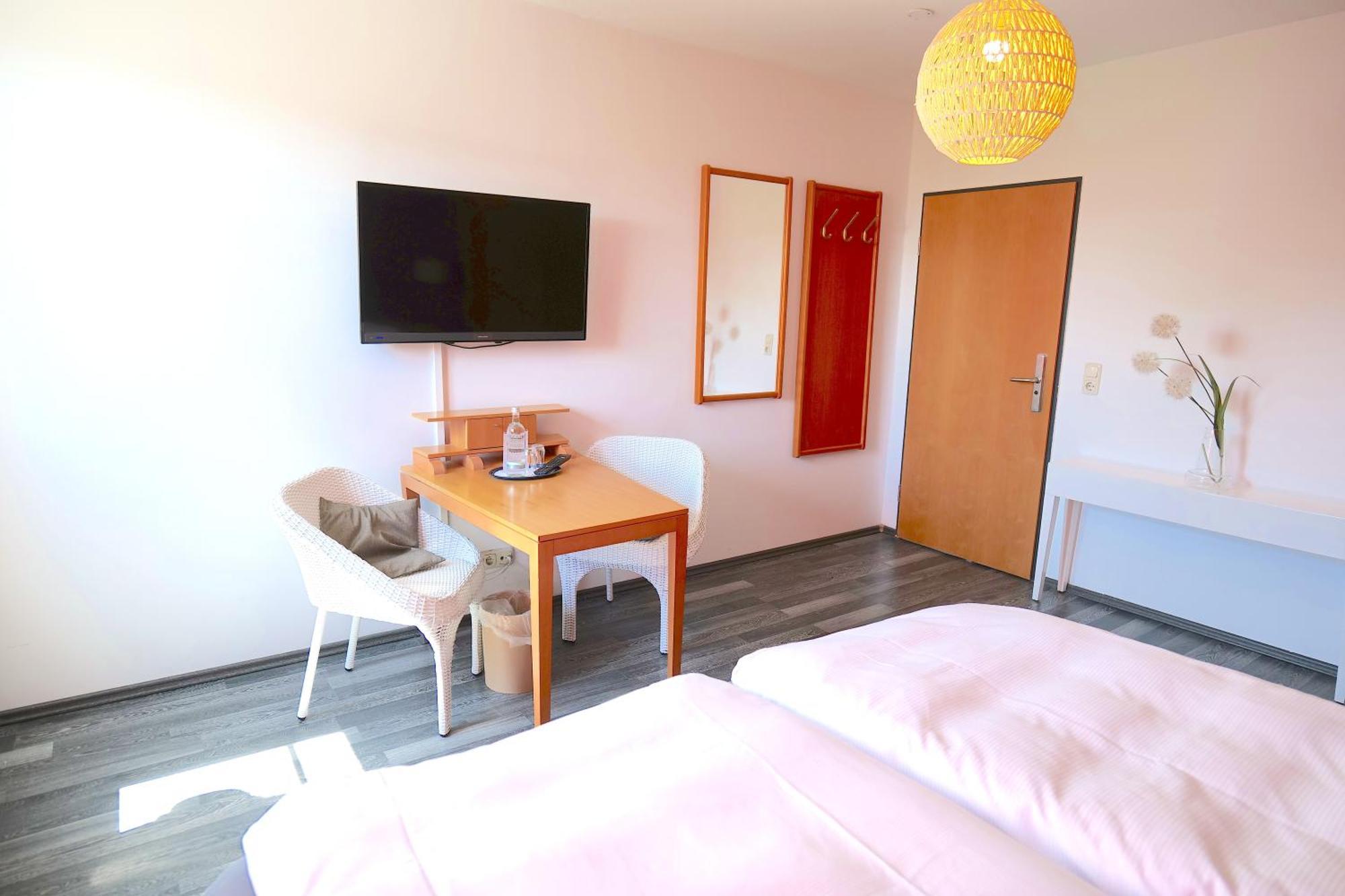 Hotel & Restaurant Am Bodden พุทบัส ภายนอก รูปภาพ