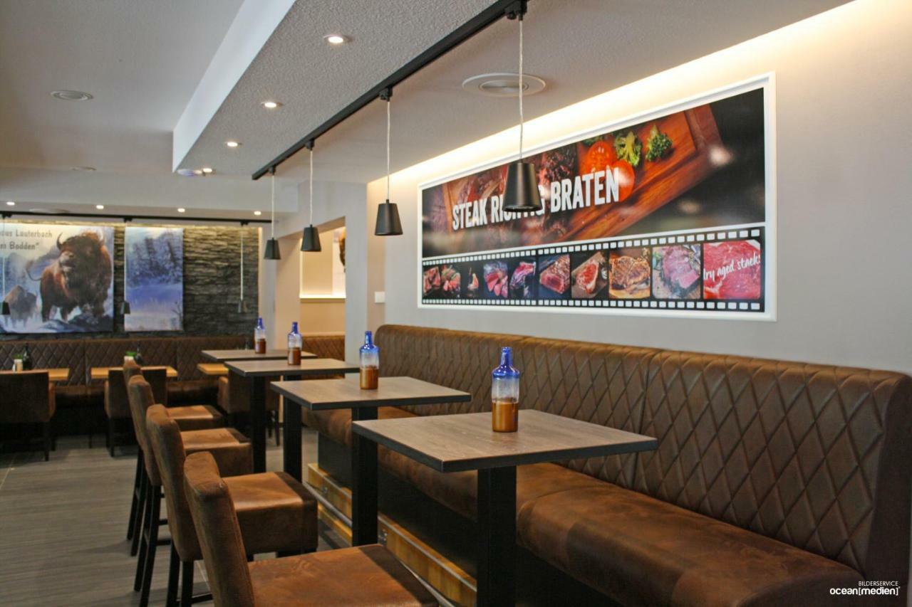 Hotel & Restaurant Am Bodden พุทบัส ภายนอก รูปภาพ