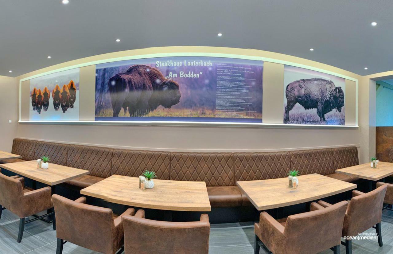 Hotel & Restaurant Am Bodden พุทบัส ภายนอก รูปภาพ